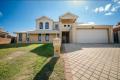 TW0- STOREY HOME WITH OCEAN OUTLOOK IN TOP LOCATION.