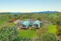 MILLION DOLLAR VIEWS – UNIQUE HOME ON THREE ACRES