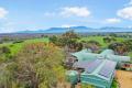 MILLION DOLLAR VIEWS – UNIQUE HOME ON THREE ACRES