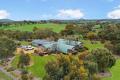 MILLION DOLLAR VIEWS – UNIQUE HOME ON THREE ACRES