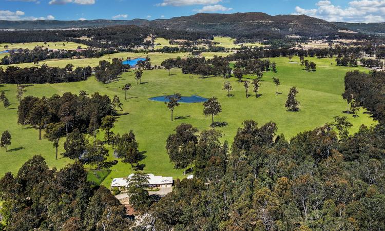 Expansive Homestead on 100 Prime rural Acres