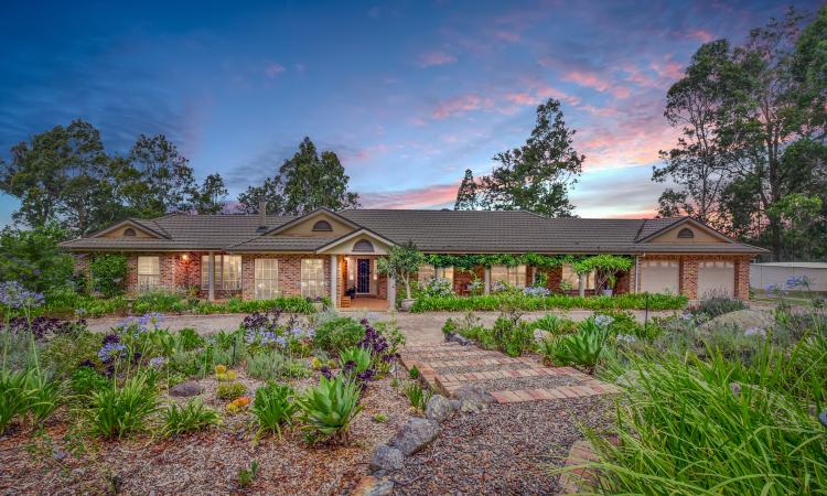 Expansive Homestead on 100 Prime rural Acres