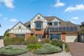 SPACIOUS COASTAL HAVEN: CONTEMPORARY CHARM & ENDLESS FAMILY-FRIENDLY APPEAL.
