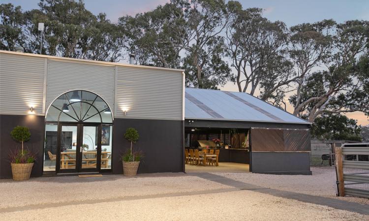 Industrial-Inspired Barndominium on 80 acres with Full Rural Setup and Luxe Modern Living!