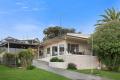 Coastal Comfort with Views, Versatility & a Sought-After Location!