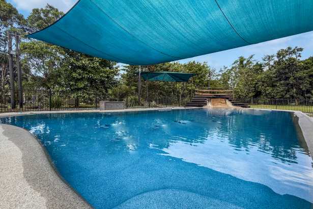 Solid Home with Massive Pool!