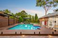 An Architectural Family Showstopper with Poolside Oasis