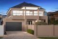 Seaside Luxury with Stunning Bay Views on Iconic Beach Road with Rear Acces