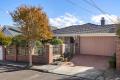 Sunlit, Elegant Living with Timeless Appeal in a Premier Location