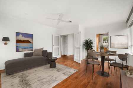 Spacious Top-Floor Apartment with Bay Views & Endless Potential