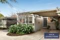 Single-Level Elegance with Sunlit Indoor/Outdoor Living