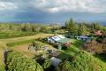 Perfectly Positioned Acreage with Ocean Views, Modern Home & Sustainable Features