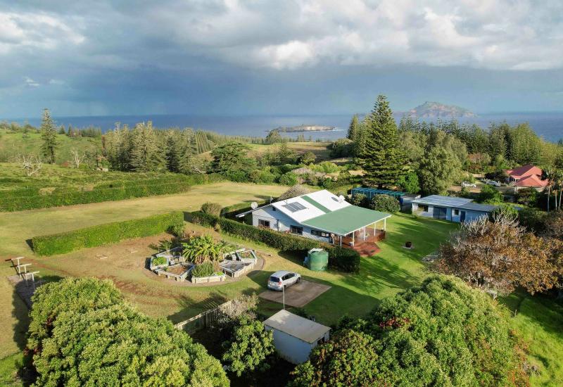 Perfectly Positioned Acreage with Ocean Views, Modern Home & Sustainable Features