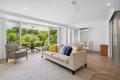 Contemporary Retreat with High-End Finishes & Peaceful Outlook in the Heart of Sunshine Beach Village, Minutes to the Beach. 