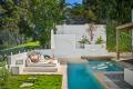 Sculptured Modernist Lair Steals Lakefront Limelight 