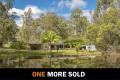 5 Usable Acres with a delightful home and Water Gallore!