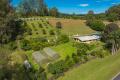 Tranquil Acreage Escape with Room to Grow