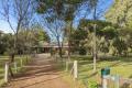 Serene Country Retreat with Equestrian Facilities & Exceptional Outdoor Living