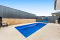 Experience modern living in this stunning home