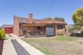 RED BRICK HOME IN THE HEART OF CULCAIRN