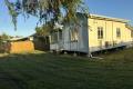 Charming Home with Renovated Bathroom and Huge Block