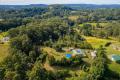 The Best of Both Worlds – Secluded Acreage Living and Just 5 Minutes From Town!