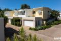 Modern Coastal Townhouse with Plunge Pool & Luxe Master Retreat