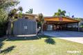 Well-Maintained Family Home with Huge Carport, Shed & More!