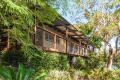 Fairweather - A private family sanctuary with sweeping water views and endless potential.