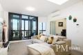 Immaculate Penthouse with Magnificent District Views