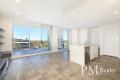 Light-Filled Apartment with District Views