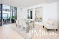A SHOWCASE OF STYLE IN A SPACIOUS GARDEN APARTMENT