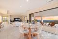 LUXURY FAMILY LIVING WITH BREATHTAKING VIEWS ON A 2372SQM HILLSIDE BLOCK