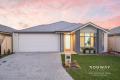 Spacious And Stylish Family Home In A Quiet Champion Lakes Location!