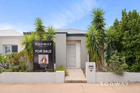 Low-Maintenance Home in the Sought-After Glades Estate