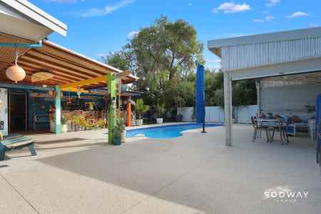 The Ultimate Entertainer's Paradise with a Self-Contained Granny Flat!