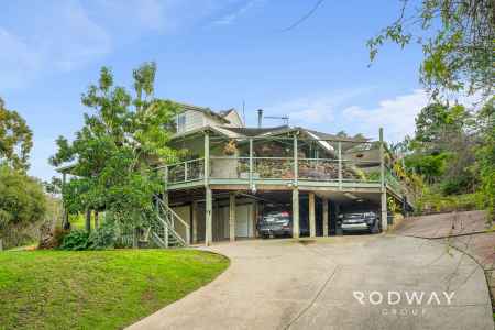 Exceptional Hills Living with Undercroft Workshop & Valley Views!