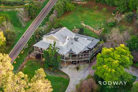 Exceptional Hills Living with Undercroft Workshop & Valley Views!