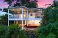 STUNNING RENOVATION WITH CORAL SEA VIEWS