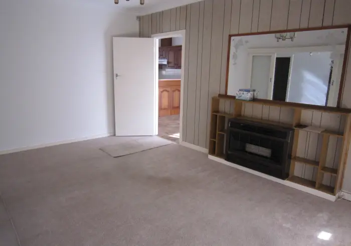 Lounge with carpet & Gas Heater.