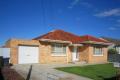 1960's SOLID BRICK HOME - IN A POPULAR LOCATION - AVAILABLE IN JANUARY 2025