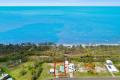 ABSOLUTE BEACHFRONT! LOWSET BEAUTY ON A 1/4 OF AN ACRE! RARE OPPORTUNITY!