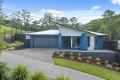 STYLISH CONTEMPORARY HOME WITH PANORAMIC VIEWS.