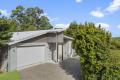 Dual-Key Residence with Exceptional Income Stream in Elevated Hinterland Pocket