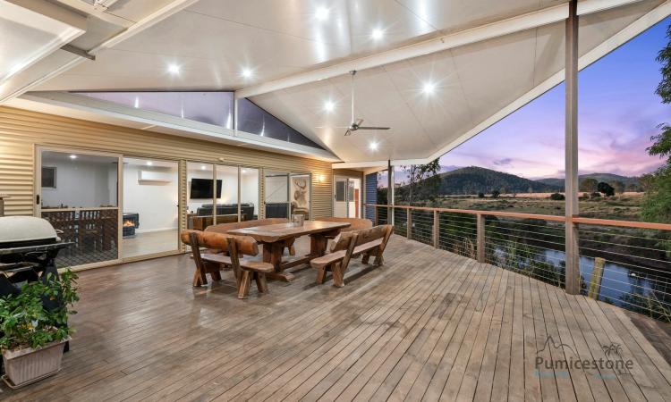 Rare Riverfront Property with Endless Potential