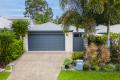 Modern living in prime location with private landscaped courtyard