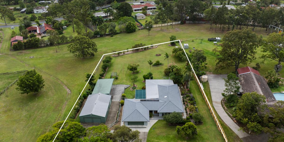 RARE OPPORTUNITY OVER 1 ACRE OF LIFESTYLE IN HEART OF OXENFORD