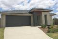 TWO LIVING AREAS, AIR CONDITIONED HOME AT YARRABILBA