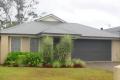 NESTLED IN THE LEAFY 'COOMERA RETREAT'