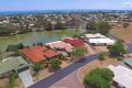 EXECUTIVE WATERFRONT HOME WITH 24 METRES OF LAKESIDE FRONTAGE AND WITHIN A SHORT WALK TO ONE OF THE BEST SANDY BEACHES IN HERVEY BAY.